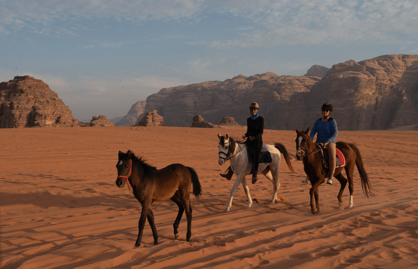 Horseback riding in the desert of Wadi Rum. Jordan